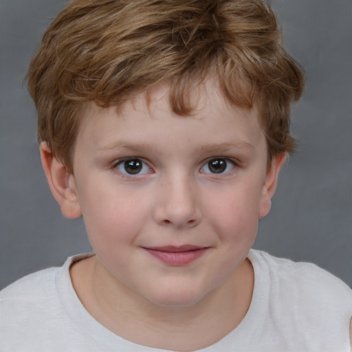 Joyful white child male with short  brown hair and brown eyes