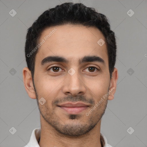 Joyful latino young-adult male with short  black hair and brown eyes