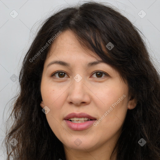 Joyful white adult female with long  brown hair and brown eyes