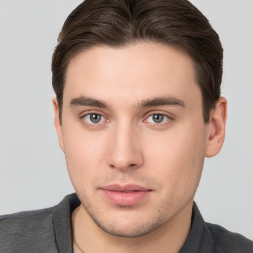 Neutral white young-adult male with short  brown hair and brown eyes