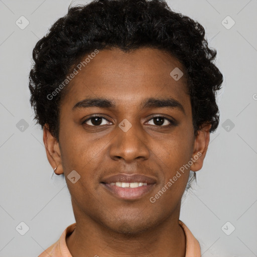 Joyful black young-adult male with short  brown hair and brown eyes