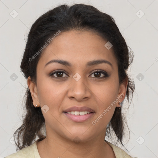 Joyful latino young-adult female with medium  brown hair and brown eyes