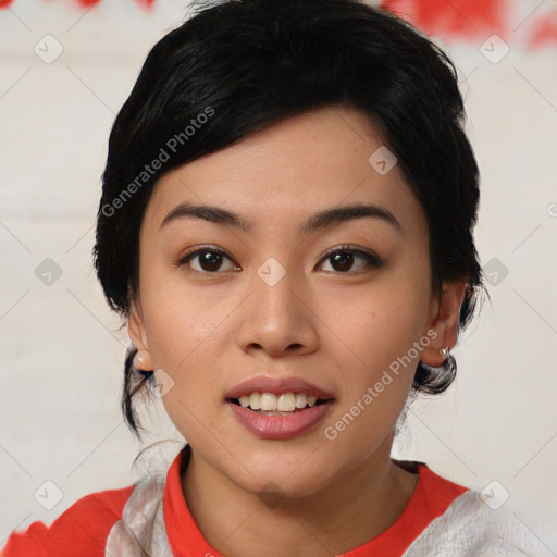 Joyful asian young-adult female with short  black hair and brown eyes