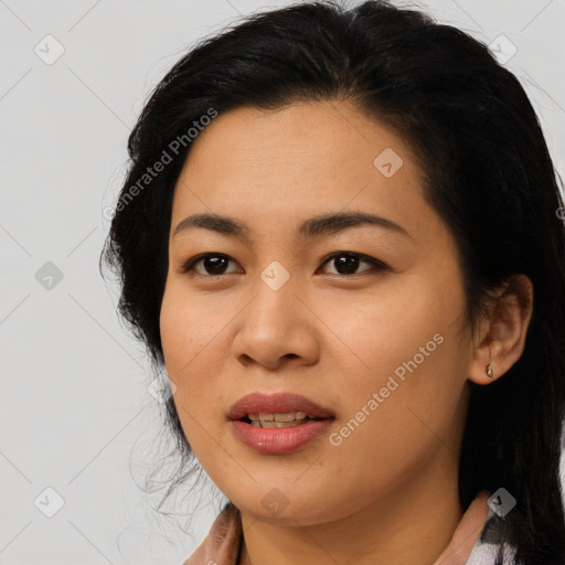 Joyful asian young-adult female with medium  black hair and brown eyes