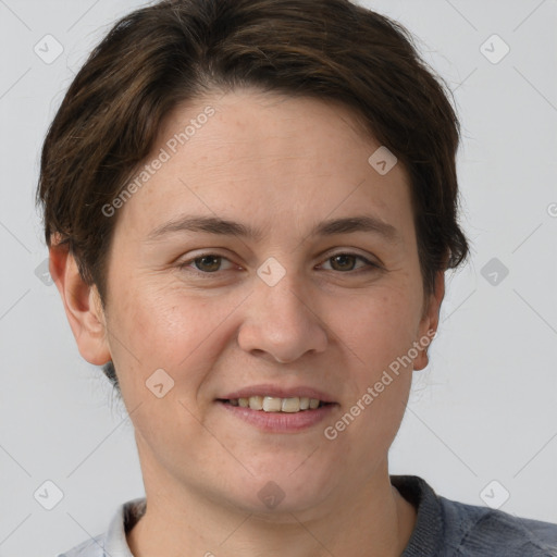 Joyful white adult female with short  brown hair and grey eyes