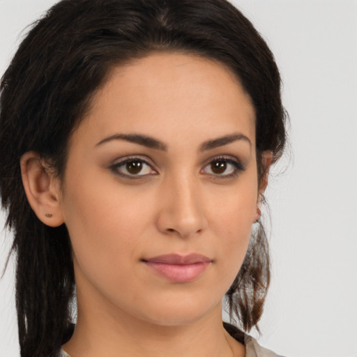 Neutral latino young-adult female with long  brown hair and brown eyes