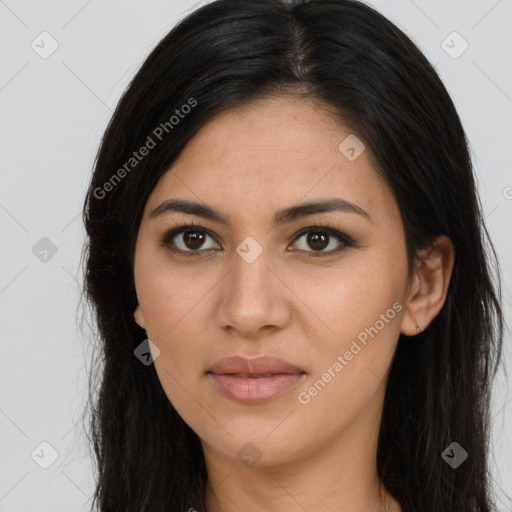 Joyful latino young-adult female with long  brown hair and brown eyes