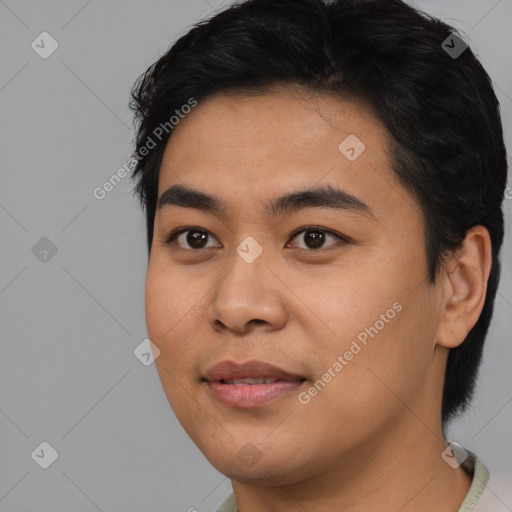 Joyful asian young-adult male with short  black hair and brown eyes