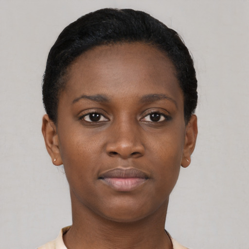 Neutral black young-adult female with short  brown hair and brown eyes