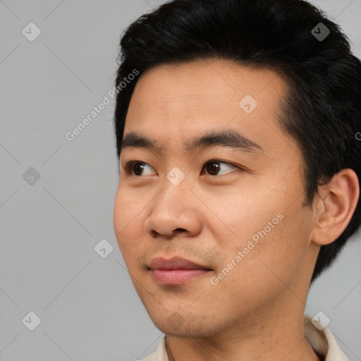 Neutral asian young-adult male with short  black hair and brown eyes