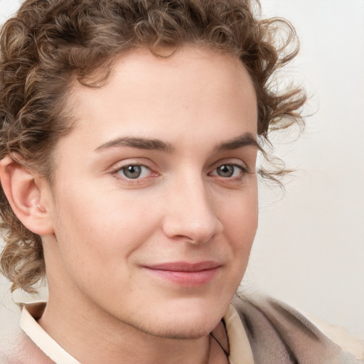 Joyful white young-adult male with medium  brown hair and brown eyes