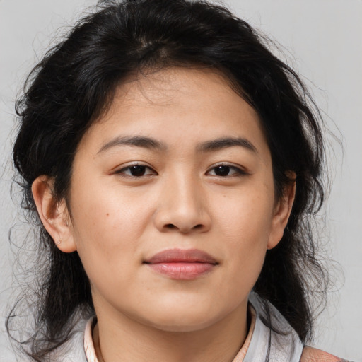 Joyful asian young-adult female with medium  black hair and brown eyes