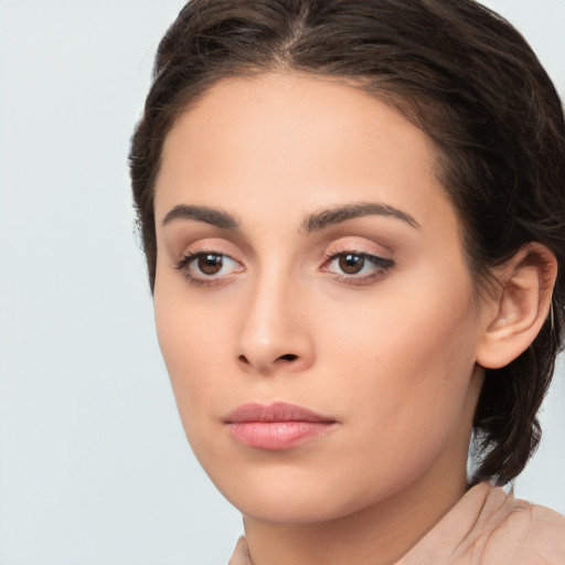 Neutral white young-adult female with medium  brown hair and brown eyes