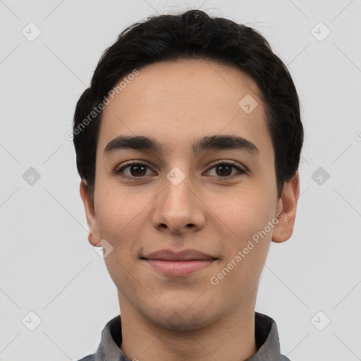 Joyful white young-adult male with short  black hair and brown eyes