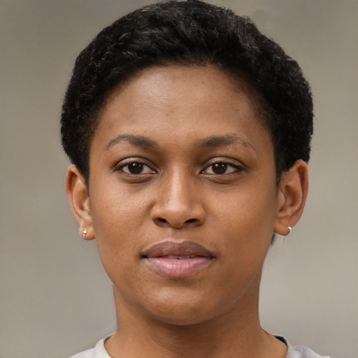 Joyful black young-adult female with short  brown hair and brown eyes