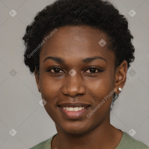 Joyful black young-adult female with short  black hair and brown eyes