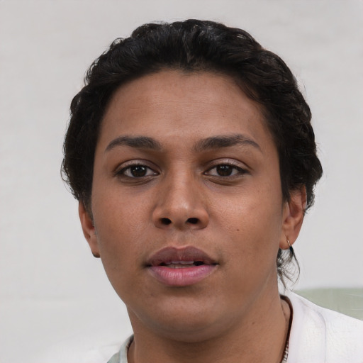 Neutral latino young-adult female with short  brown hair and brown eyes