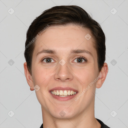 Joyful white young-adult female with short  brown hair and grey eyes