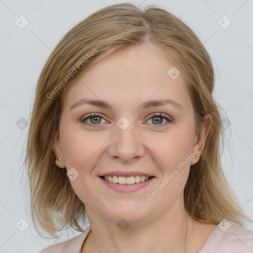 Joyful white young-adult female with medium  brown hair and grey eyes