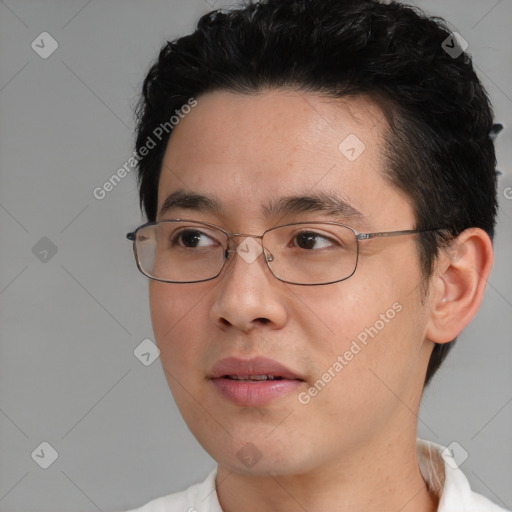 Neutral asian young-adult male with short  black hair and brown eyes