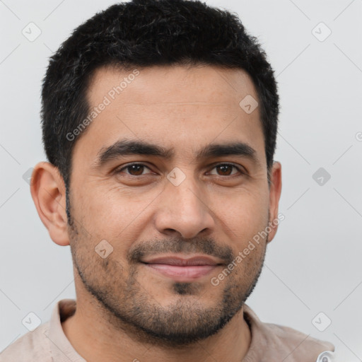 Joyful latino young-adult male with short  black hair and brown eyes