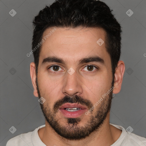 Neutral white young-adult male with short  black hair and brown eyes
