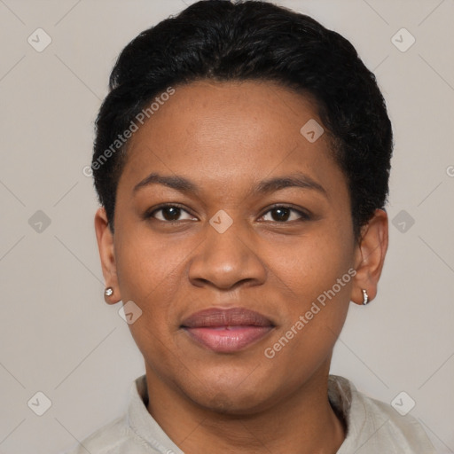 Joyful black adult female with short  black hair and brown eyes