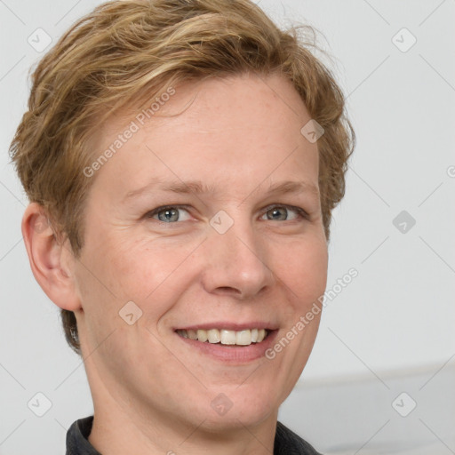 Joyful white adult female with short  brown hair and grey eyes