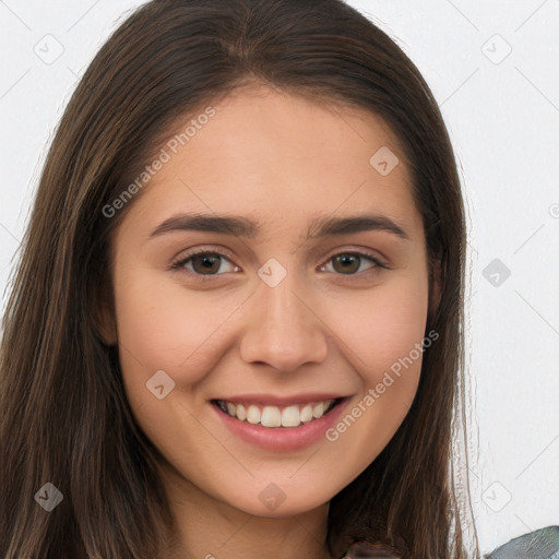 Joyful white young-adult female with long  brown hair and brown eyes