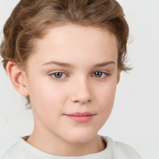 Joyful white child female with short  brown hair and brown eyes