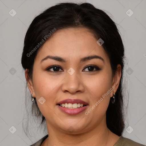 Joyful latino young-adult female with medium  brown hair and brown eyes