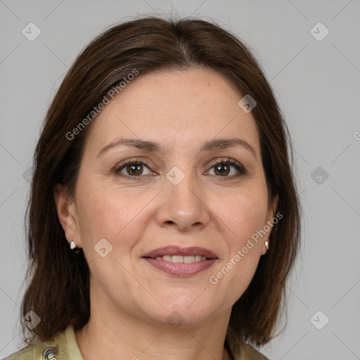 Joyful white adult female with medium  brown hair and grey eyes