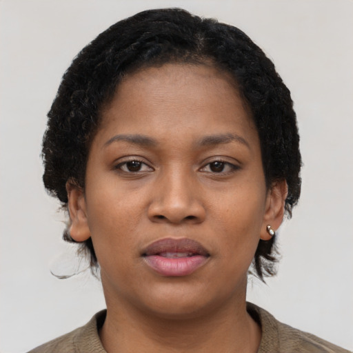 Neutral black young-adult female with short  brown hair and brown eyes
