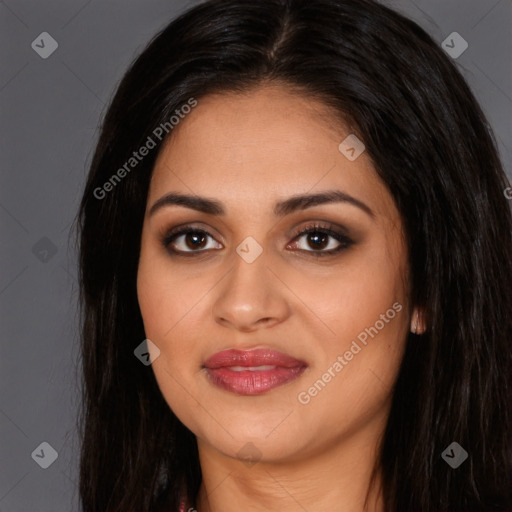 Joyful latino young-adult female with long  brown hair and brown eyes