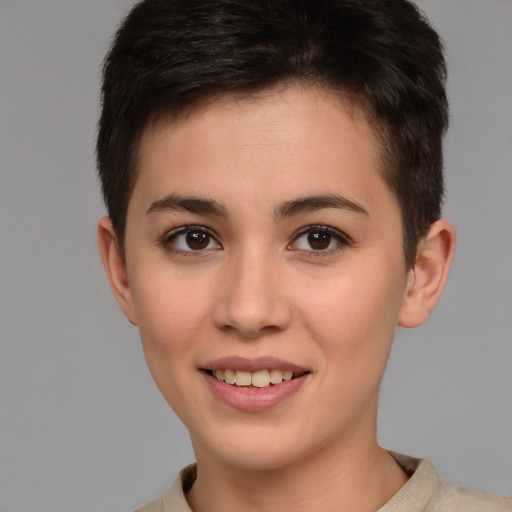 Joyful white young-adult female with short  brown hair and brown eyes