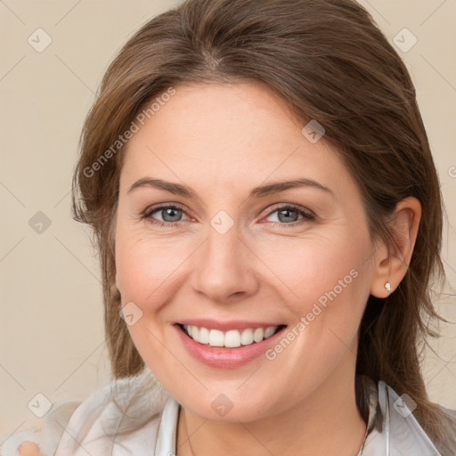 Joyful white young-adult female with medium  brown hair and blue eyes