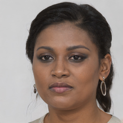 Neutral black young-adult female with long  black hair and brown eyes