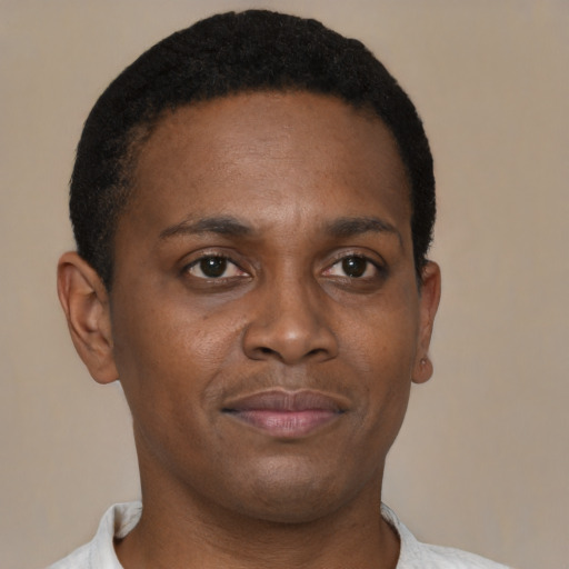 Neutral black young-adult male with short  brown hair and brown eyes
