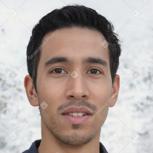 Joyful asian young-adult male with short  black hair and brown eyes