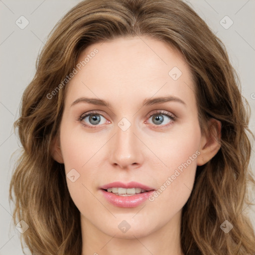 Joyful white young-adult female with long  brown hair and green eyes