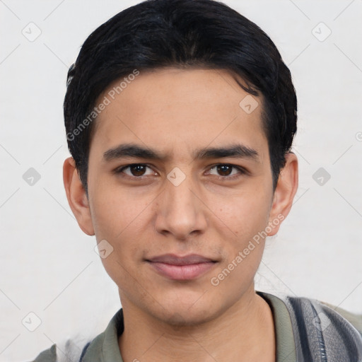 Joyful latino young-adult male with short  black hair and brown eyes