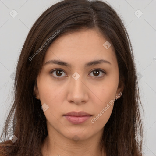 Neutral white young-adult female with long  brown hair and brown eyes