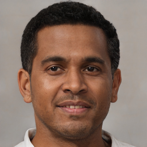 Neutral black young-adult male with short  brown hair and brown eyes