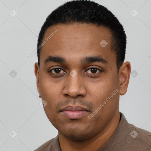 Neutral latino young-adult male with short  black hair and brown eyes