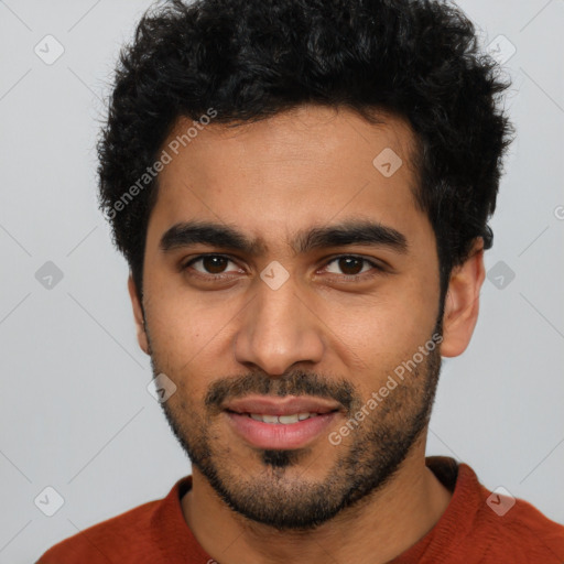 Joyful latino young-adult male with short  black hair and brown eyes