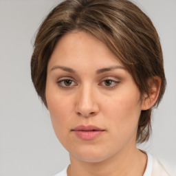 Neutral white young-adult female with medium  brown hair and brown eyes