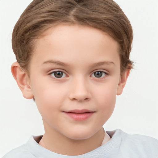 Joyful white child female with short  brown hair and brown eyes