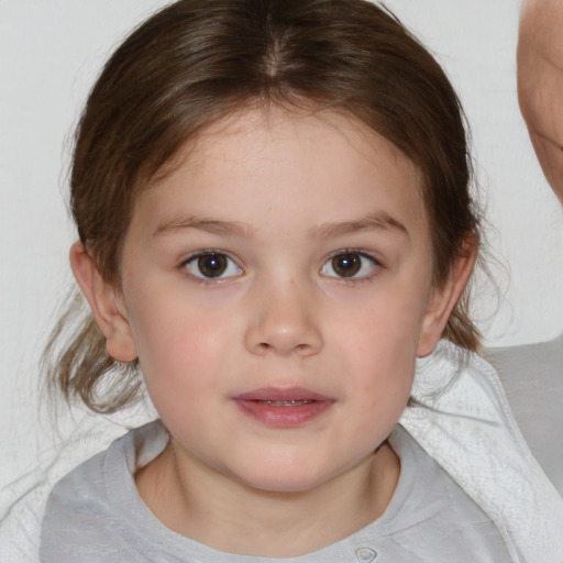 Neutral white child female with medium  brown hair and brown eyes