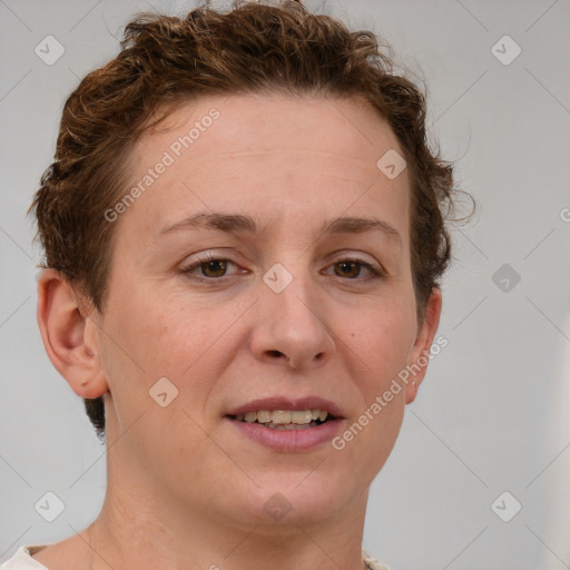 Joyful white adult female with short  brown hair and grey eyes