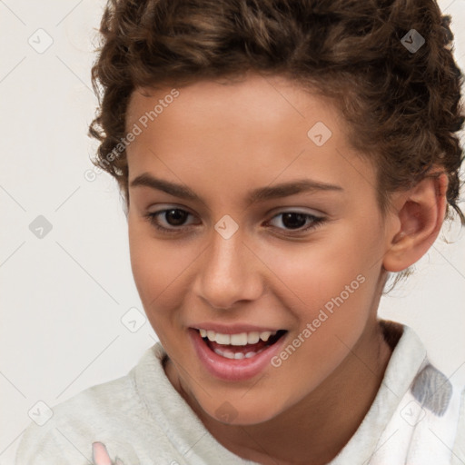 Joyful white child female with short  brown hair and brown eyes